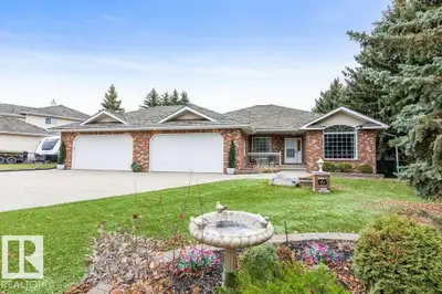 The acreage property you’ve been dreaming of just hit the market! This exceptional custom estate bun...