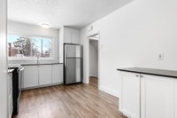 Fully renovated spacious 2 & 3 bedroom townhomes features kitchen with modern features and finishes... (image 4)