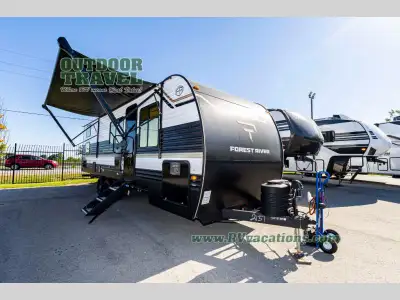 Prime Time Avenger travel trailer 26DBS highlights: Large Slide Out TV and Fireplace Oversized Windo...