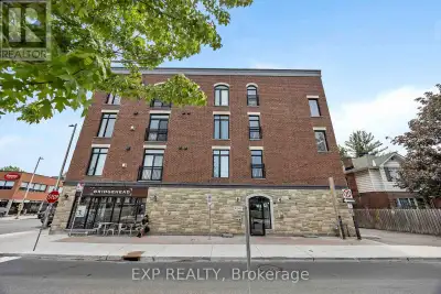 Live the Old Ottawa South lifestyle in a boutique red-brick building at Bank and Grove, with the Rid...