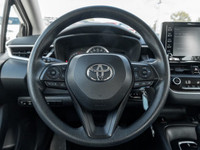 The 2021 Toyota Corolla LE in stunning black with a Front-Wheel Drive FWD and a seamless handling ex... (image 7)