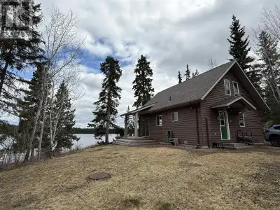 First time offered! This is a spectacular little year round home plus additional adjoining lot with...
