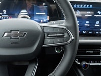 The 2026 Chevrolet Traverse LT AWD stands out in a bold White finish that complements its wide, athl... (image 9)