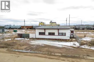 1.12 Acres in Wainwright with 960 Sq. Ft. Office building. Lot is fully fenced with parking in front...