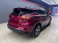 The 2021 Nissan Murano AWD SV in a striking Red finish promises confidence and capability with its a... (image 9)