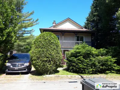 Maison de style cottage, orientation sud, rez-de jardin, 25 x 35 pi2 irr. sur terrain plat de 20,000...