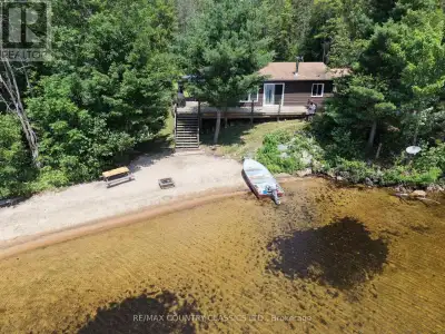 Paugh Lake, Barry's Bay - Four-season, 2-bedroom cottage on a 150-foot waterfront, level lot of over...