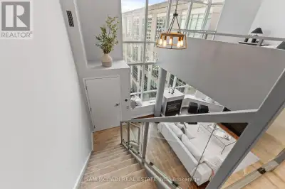 Welcome to your Penthouse Loft with breathtaking views of the lake and rooftop garden terrace. This...