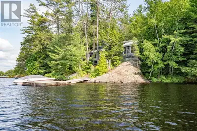 This 4 bedroom Kahshe Lake cottage is uniquely designed and just waiting for a new owner to put thei...