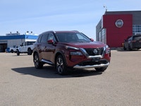 This pre-owned 2023 Nissan Rogue Platinum is finished in a beautiful Red paint with a refined Graphi... (image 8)