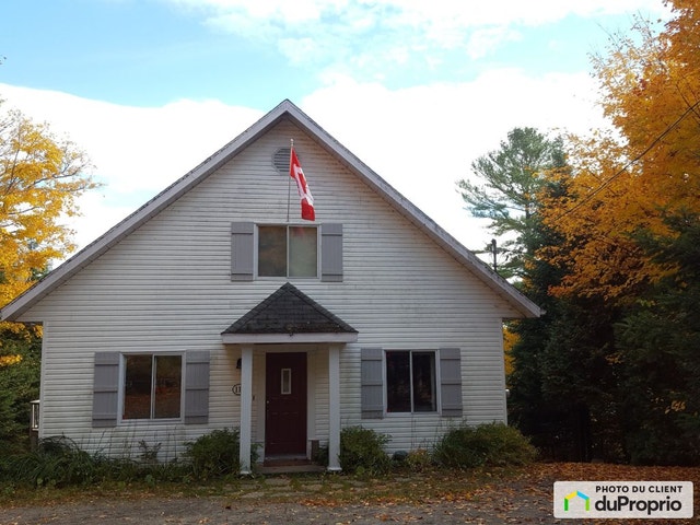 $735,000 - Cottage for sale in Lac-Superieur — photo 1