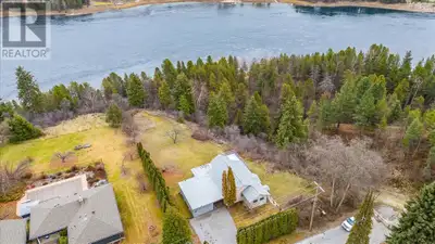 Cozy Riverfront Home on 1.25 Acres! Nestled on the riverbank of the Columbia River, this charming 2-...