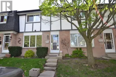 Move-in-ready townhouse condo in a quiet enclave. Main floor highlights a 2023 kitchen with new coun...