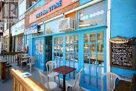 Busy, beloved & established shop 'The Fish Store & YuNes' Sandwiches' in the heart of Little Italy t...