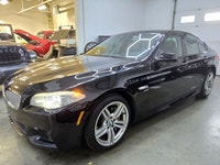 Experience German luxury and performance with this 2011 BMW 550i xDrive — a luxury AWD sport sedan t... (image 1)