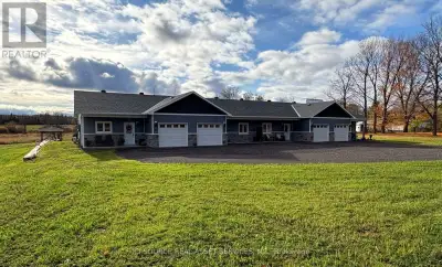 Maintenance-free, single-level living in a newly constructed slab-on-grade garden home, designed for...