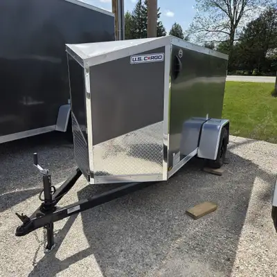 THIS COMPACT 2027 US CARGO WEIGHS 762 LBS AND CAN CARRY 1238 LBS OF CARGO. BOTH CHARCOAL GREY AND BL...
