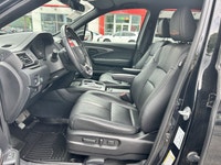 Conquer every adventure with the rugged yet refined 2023 Honda Passport TrailSport, a vehicle engine... (image 8)