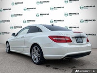 Step into elegance with this 2011 Mercedes-Benz E-Class E 550 Coupe, showcasing a crisp White exteri... (image 3)