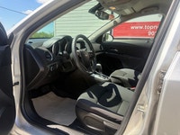 A practical compact sedan with a comfortable interior, modern convenience features, and efficient pe... (image 8)