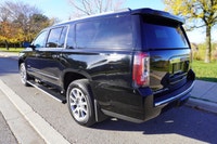 WOW! Check out this awesome full sized Yukon XL Denali that just arrived at our store. This beauty i... (image 2)