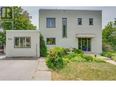 Step into timeless elegance with this iconic 5-bedroom 1938 home, set on a 0.44-acre lot on one of E...