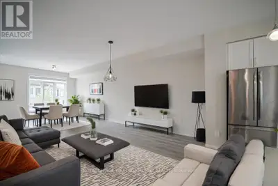 Welcome to this stunning lakeside townhome, offering breathtaking waterfront views form every level....