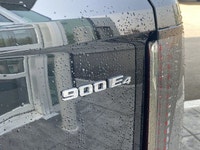 The 2026 Cadillac Vistiq 1SH, finished in elegant Stellar Black Metallic with a Jet Black interior,... (image 6)