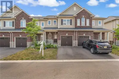 Step into easy living with this beautifully built townhome (2021), nestled in a sought-after communi...