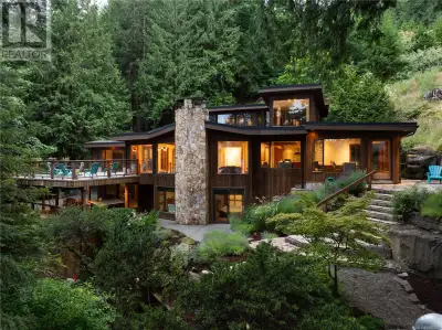A rare offering—this private, custom-designed oceanfront residence offers over 4000 square feet of t...