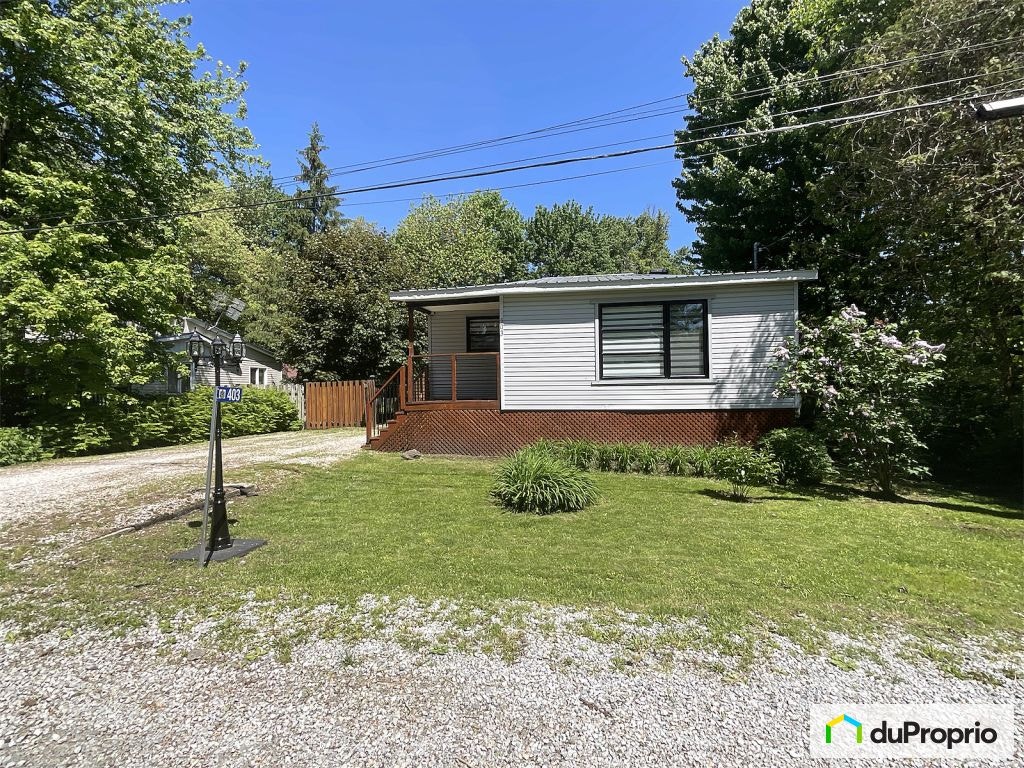 $320,000 - Bungalow for sale in Henryville — photo 1