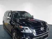 Experience luxury and power in the 2024 Nissan Armada 4x4 Platinum, presented in an eye-catching Bla... (image 2)