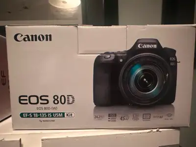 Upgraded. Strap, Battery and charger included. Rubber Eye piece included.