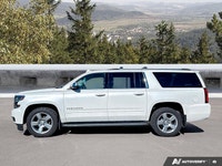 Command journeys in the impressive 2018 Chevrolet Suburban Premier. Showcased in a luminous Iridesce... (image 1)
