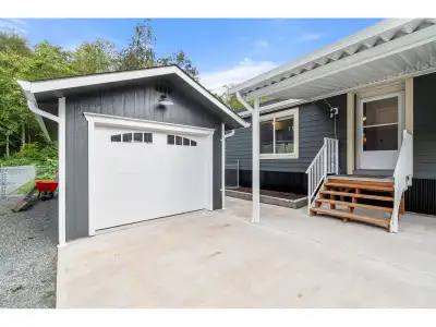 Peaceful living in a community setting. This double wide home is tucked away in a quiet park, a shor...