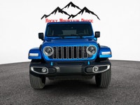 THIS WRANGLER SAHARA UNLIMITED COMES WITH THE 2.0L DOHC PHEV ENGINE, PREMIUM MCKINLEY HEATED LEATHER... (image 7)