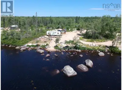 With 164 ft of lakefront on Sandy Bottom Lake, Nova Scotia, this 3.82-acre lot is ideal for camping...