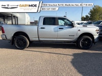 The 2026 Ram 3500 Big Horn, presented in an eye-catching silver hue, merges robust 4x4 capabilities... (image 1)