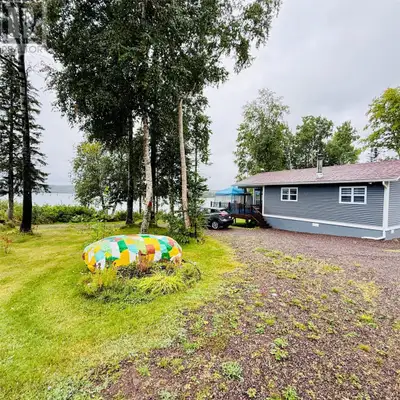 Welcome to this enchanting 2-bedroom, 1-bathroom oceanfront cottage that truly feels like something...