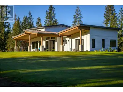 Discover your dream oasis on 13.27 acres of flat, usable land, featuring 6 acres cultivated in hay,...