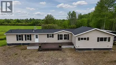 Escape to country living without sacrificing convenience on this beautiful 4.99-acre property locate...