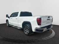 Welcome to Capital GMC! Looking for more luxury in the All New GMC Sierra? This 4WD White Sierra SLT... (image 2)