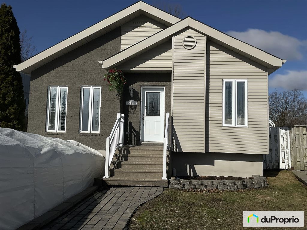 $524,900 - Bungalow for sale in Ste-Rose — photo 1