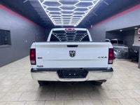 Get ready to own the roads with the stunning 2023 Ram 1500 Classic SLT 4x4 Crew Cab in a pristine wh... (image 9)