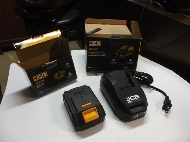 NEW 20V BATTERY AND CHARGER COMPLETE in General Electronics in Belleville - Image 2