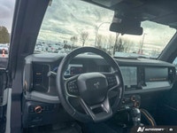 Propel your adventures with the formidable 2021 Ford Bronco. This remarkable used convertible, finis... (image 8)