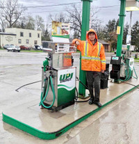 Old UPI Gas Pump and Signs 