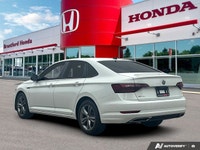 Embrace a more connected and efficient journey with the 2019 Volkswagen Jetta Highline, designed to... (image 4)