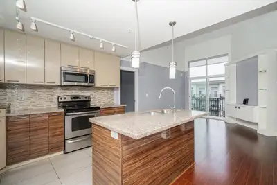 **CENTRAL LOCATION**OVER 12FT HIGH CEILINGS, PENTHOUSE UNIT WITH 2 BEDROOMS & 2 FULL WASHROOMS** Ama...