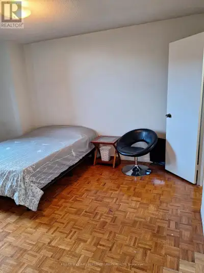 Welcome to this bright and airy 3-bedroom condo offering a private furnished bedroom with large wind...